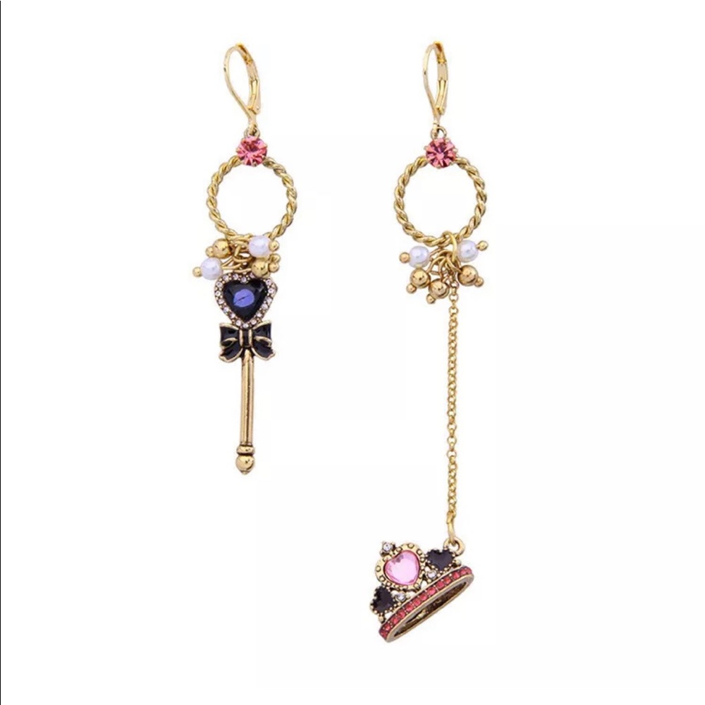 Assymetrical crown and wand earrings